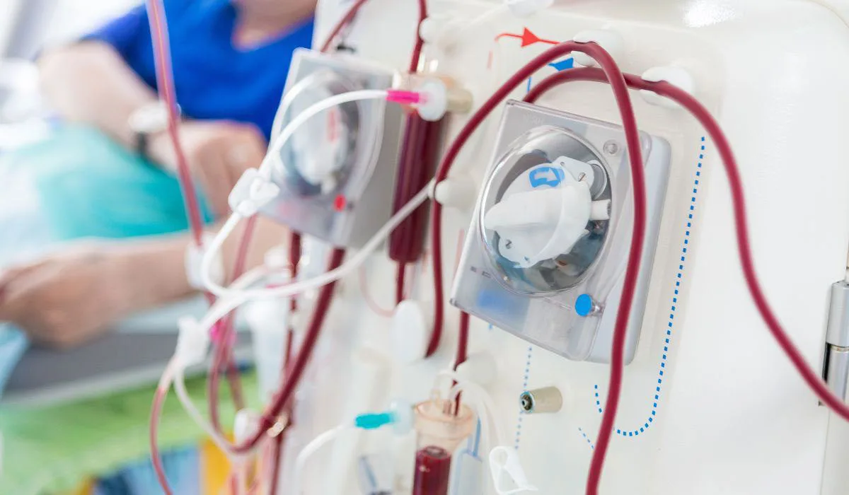 Dialysis technology student operating dialysis machine at Apollo Hospital